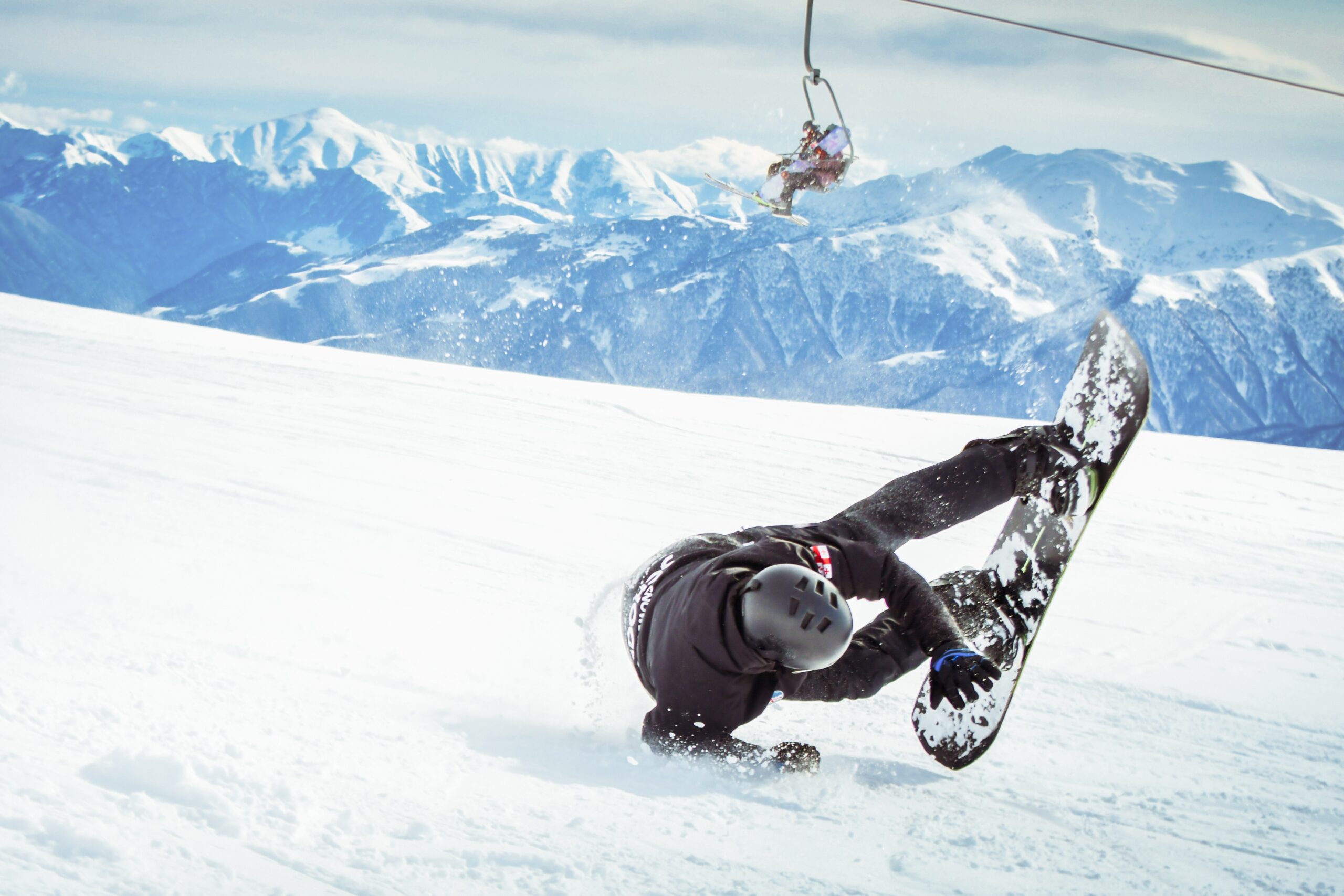 Real,Snowboarder,Falls,At,Off,Piste,Ski,Slope.,Ski,Safety